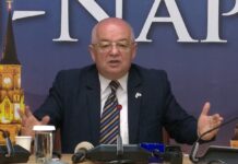 Gușă: Emil Boc, fostul activist PCR, captivul Statului Paralel, mostră vie a perversiunii liberale!