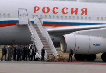 Imagine virală cu soldaţi americani îngenungheaţi lângă avionul lui Putin. „O capitulare istorică, rușine!”