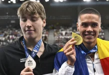 Rușii recunosc superioritatea lui David Popovici asupra campionului lor. L-au denumit ”Titanul din România”!