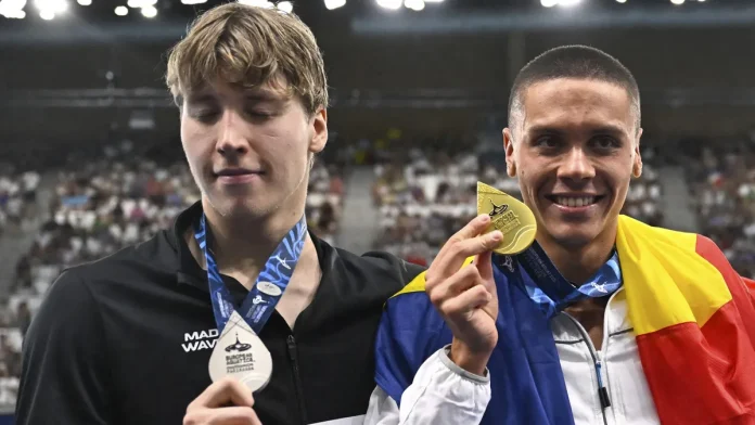 Rușii recunosc superioritatea lui David Popovici asupra campionului lor. L-au denumit ”Titanul din România”! Rușii recunosc superioritatea lui David Popovici asupra campionului lor. L-au denumit ”Titanul din România”!