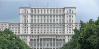Bolojan are energie pentru Ucraina, românilor le cere economie. Luni seara Palatul Parlamentului iluminat în galben-albastru!